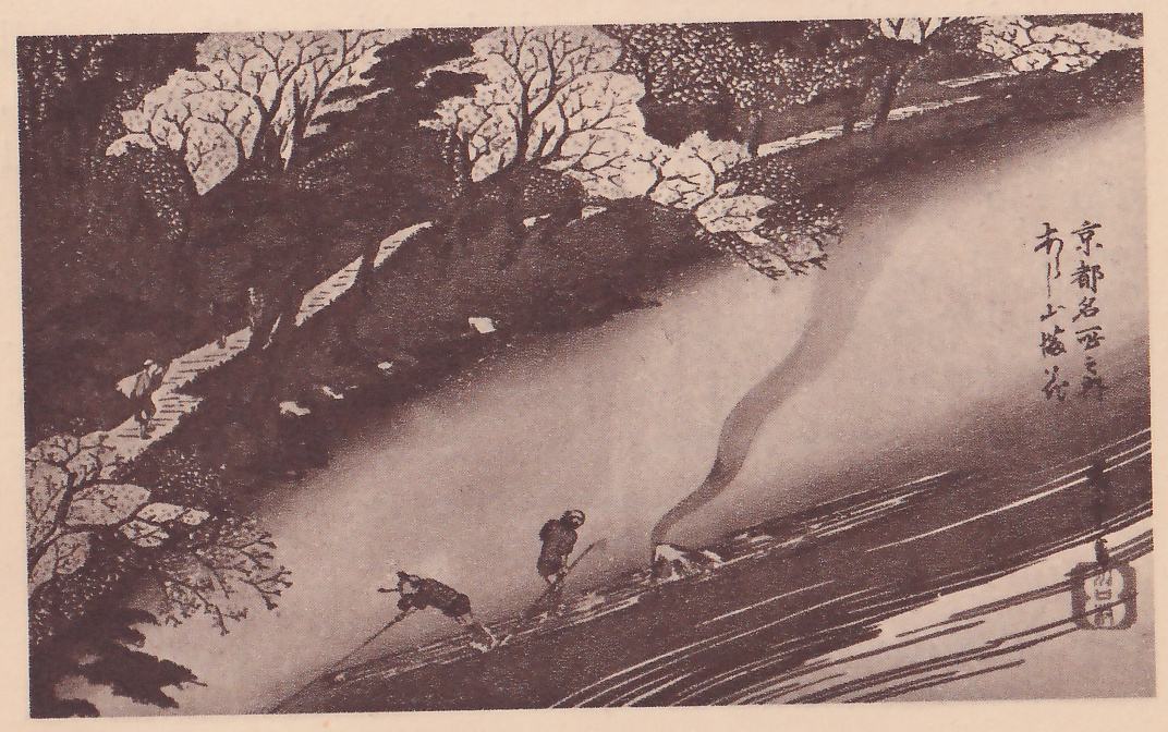 Print of a river running diagonally past a bank of flowering cherry trees: pale blossoming trees line the upper left bank above a paved path where a small figure carrying a bundle walks, and a thin line of smoke rises from a raft at the center. Two figures with long poles stand on a long, flat raft on the swift water at the lower left. Title writing is at the right edge, with a signature and seal below it.