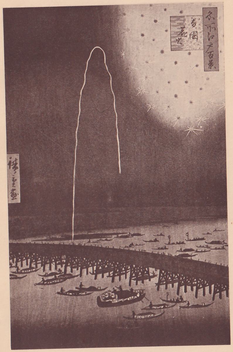 Tall print of a night sky with fireworks over a river: a thin white line rises from the bridge at the lower left in a slender arc of light, and a large round burst of white sparks and pale stars fills the upper right of the dark sky. A long bridge on many posts crosses the river in the lower half, and many small boats with people crowd the water, with a larger boat at the lower center. A title cartouche is at the upper right and a signature at the left edge.