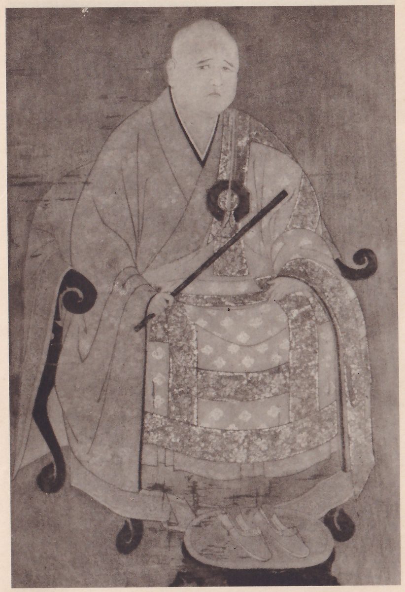 Faded painting of a seated bald man with a downturned mouth in a robe with a pale patterned cloth over his lap, on a chair with curled dark arm ends, holding a long dark stick that slants up across his chest to the right; shoes sit on a low footstool at the bottom.