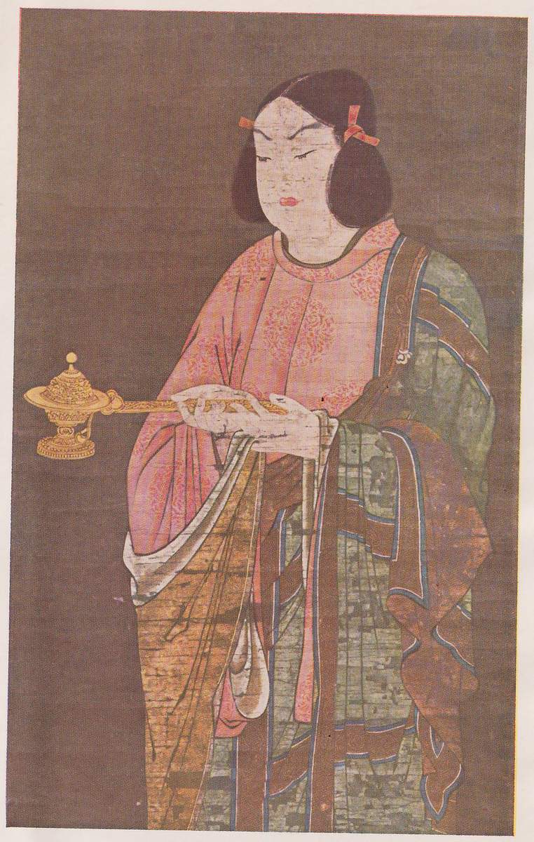 Colored painting on a dark brown ground of a standing figure with a pale face and lowered eyes, dark hair in two rounded bunches at the sides of the head tied with red, a pink robe under a green and brown patterned outer robe, and both hands held together at the chest around a long thin handle that ends in a small gold lidded cup held out to the viewer's left.