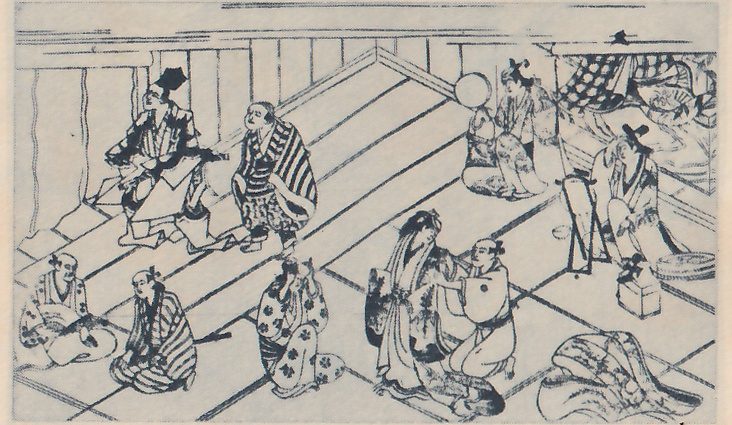 Line print, seen from above, of people in a room whose floor is laid with wide diagonal boards. At the upper left a man in a dark coat and tall black cap kneels beside a man in a striped garment who sits with his knees up. At the center a person with long hair stands while a kneeling person with a round crest on the back faces them, with both hands at their chest. At the upper right people sit near a round pale disk on a stand and a box, and at the lower left people sit, one with hands raised to the face; a heap of cloth lies at the lower right.