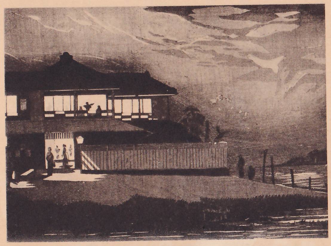 Black-and-white print of a large two-storey building with a curved tiled roof beside water. Lit windows in the upper floor show two dark figures, and a lit doorway at the lower left shows figures against a pale panel, with a lamp hanging at its side. A long fence of upright boards runs along the front. At the right a dark bank with posts leads toward the water, with two dark figures standing on it, and a far shore shows at the right edge. Long streaky cloud shapes fill the sky at the upper right.