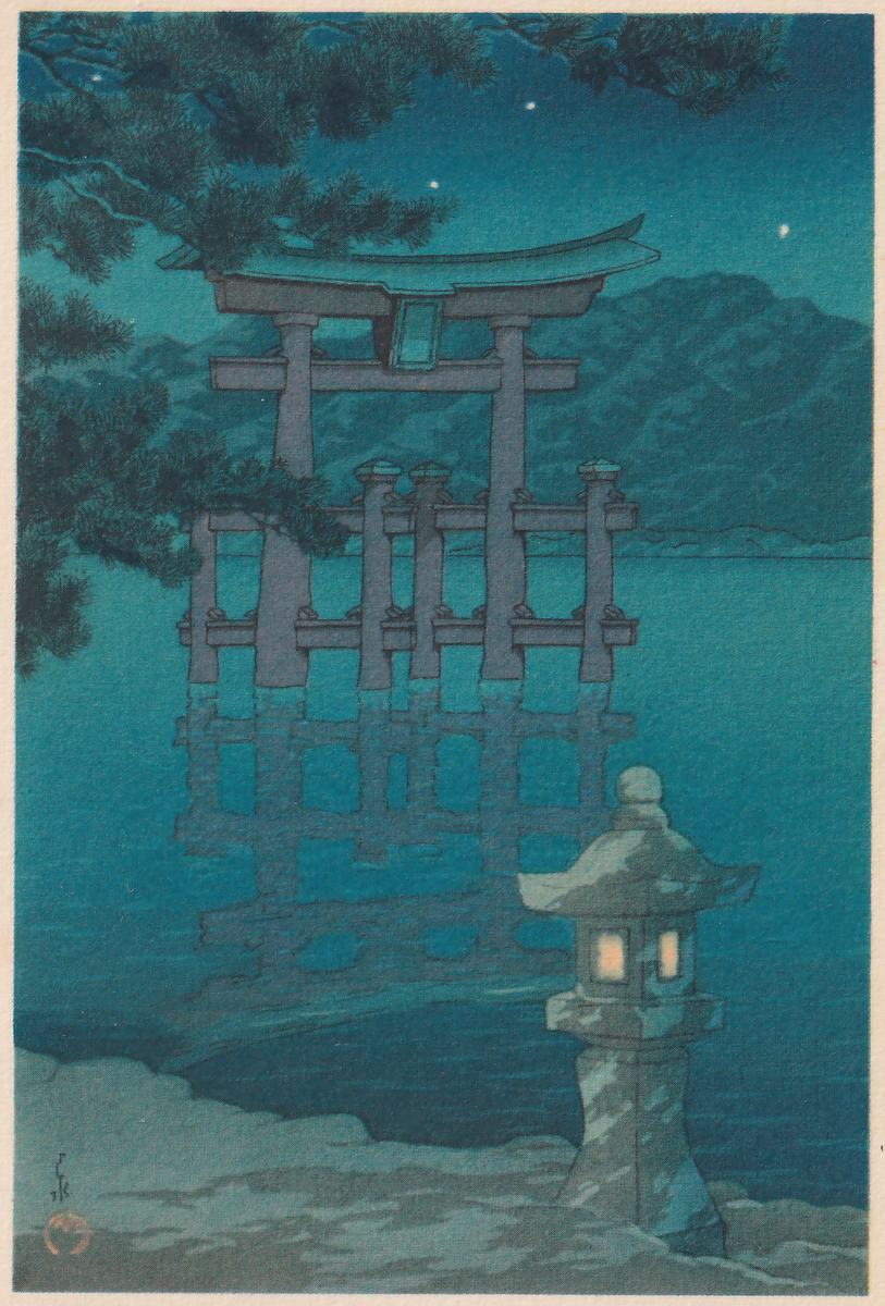 Colour print in blue and green tones of a large gateway with two thick posts, two crossbars and a curved double top beam, standing in dark water with shorter posts beside it and its reflection below. A stone lantern with two small yellow windows stands at the lower right on a pale shore. Pine branches hang across the upper left, a dark mountain fills the far shore behind the gateway, and a few white dots show in the dark blue sky. A small signature and a round red seal stand at the lower left.