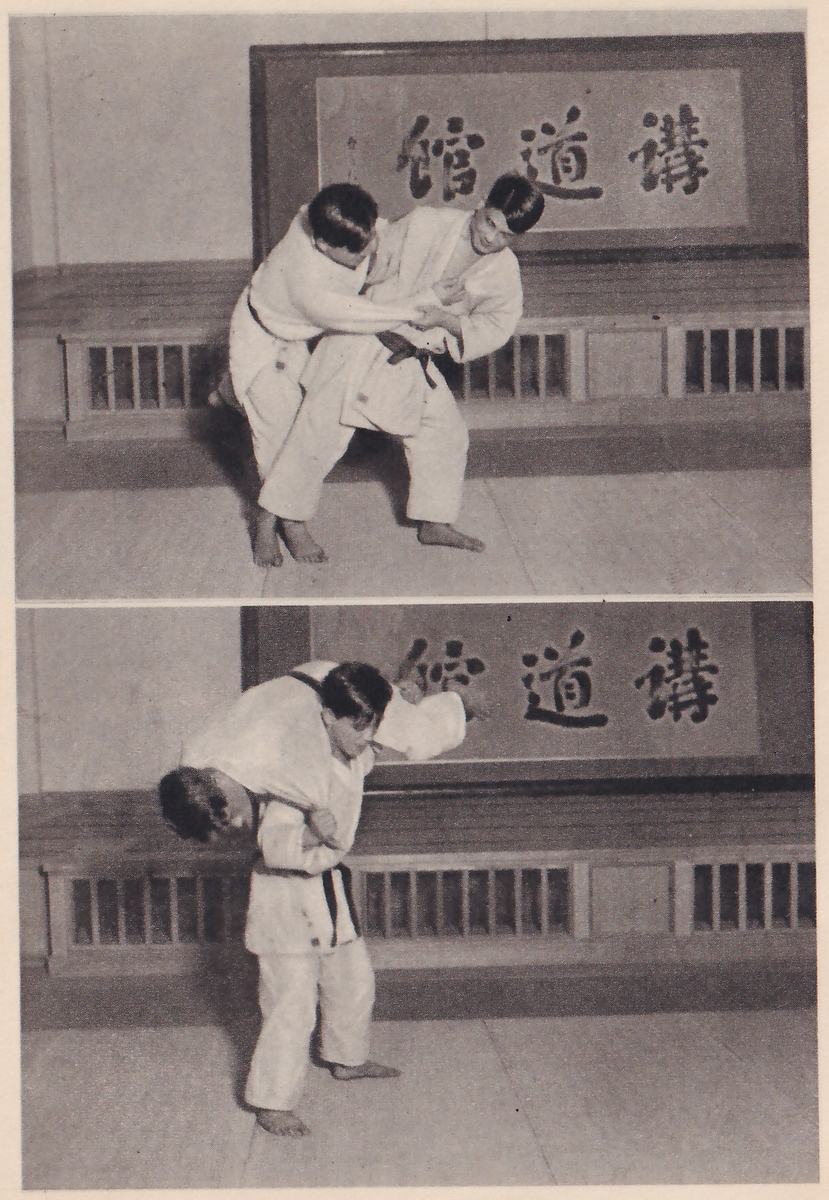 Two photographs, one above the other, in front of a large framed 講道館 sign. In the upper one the thrower on the right holds his opponent close and pulls him forward and off balance. In the lower one the thrower carries his opponent across his shoulders, the opponent's head hanging at one side and his legs at the other.