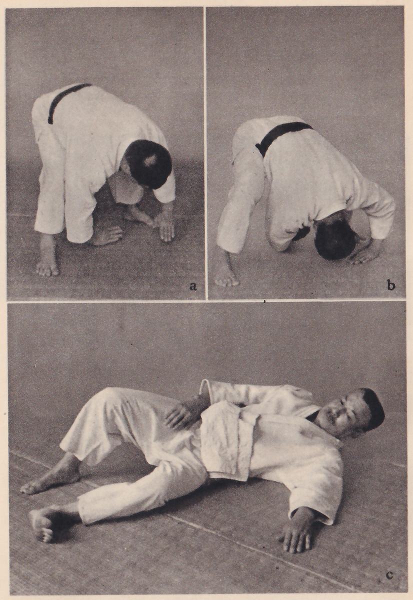 Three photographs lettered a, b and c. In a (upper left) a man in a judo suit crouches forward with one hand on the mat and his head lowered. In b (upper right) he tucks his head under, his back to the camera. In c (below, wide) he lies on his side on the mat with one arm out and his legs bent.