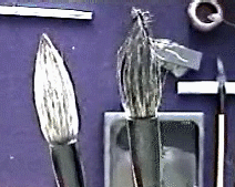 Both brushes shown here are inked. The brush on th